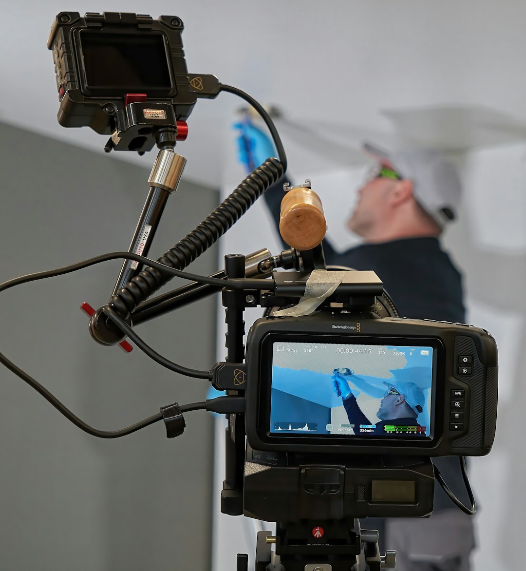 Finnish camera operator with a professional broadcast camera